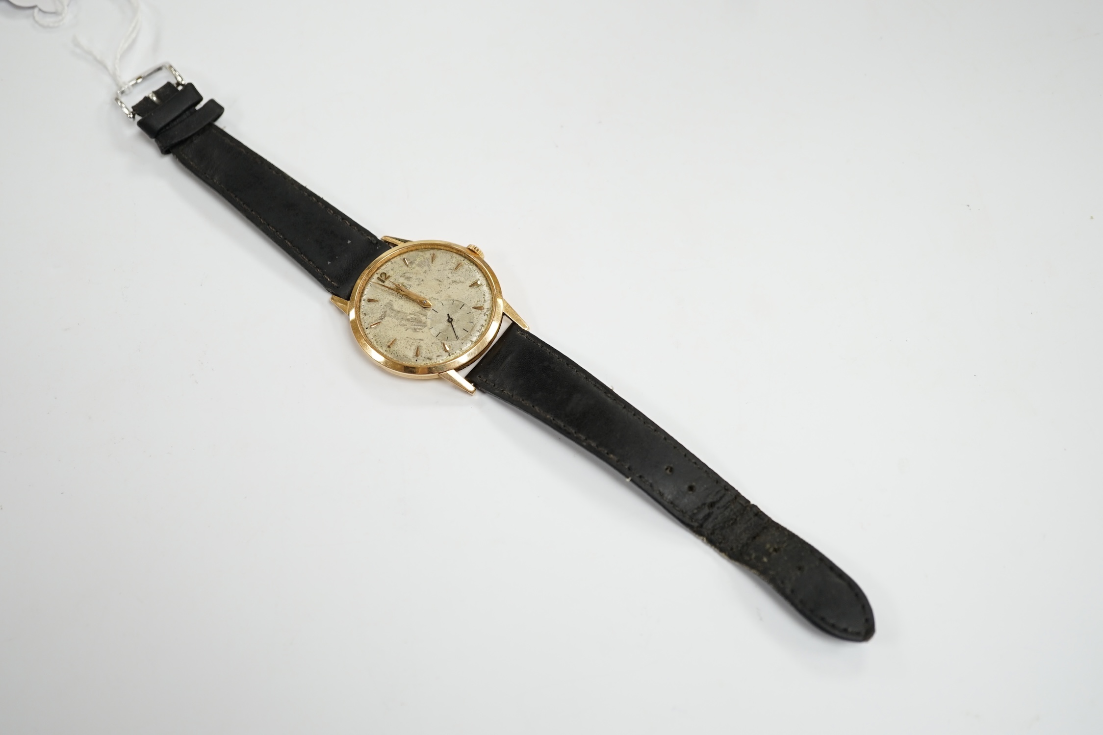 A gentleman's 18k Omega manual wind wrist watch, on a later associated leather strap, case diameter 37mm. (a.f.)